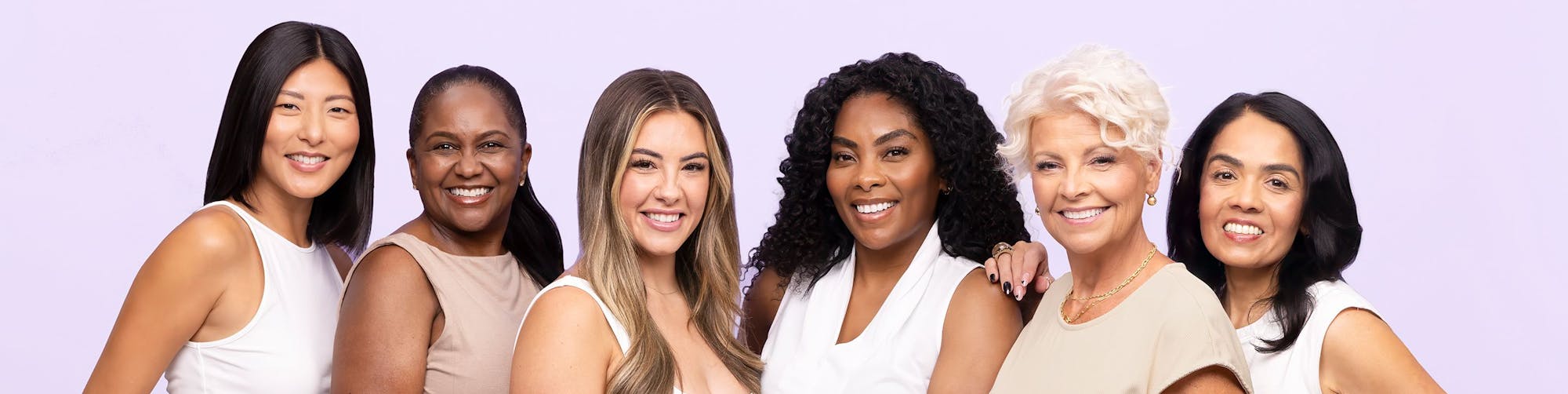 A group of women who use GoPure skincare, radiant and smiling.