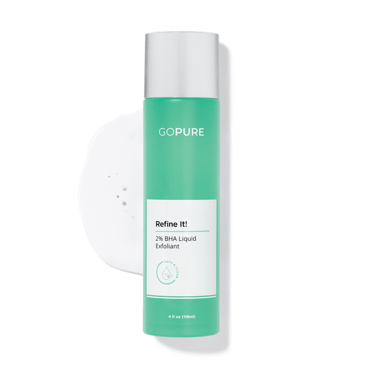 Two GoPure skincare products against a light gray background: a tall bottle of Refine It! 2% BHA Liquid Exfoliant and a shorter bottle of Wake Up Radiant AHA Peel with 15% AHAs, 4% Phytic Acid, and Pumpkin Enzymes.